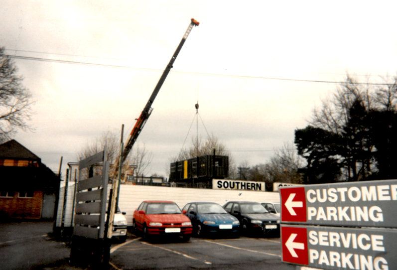 A crane moving a block of a modified contender that became our first residential block in 1994